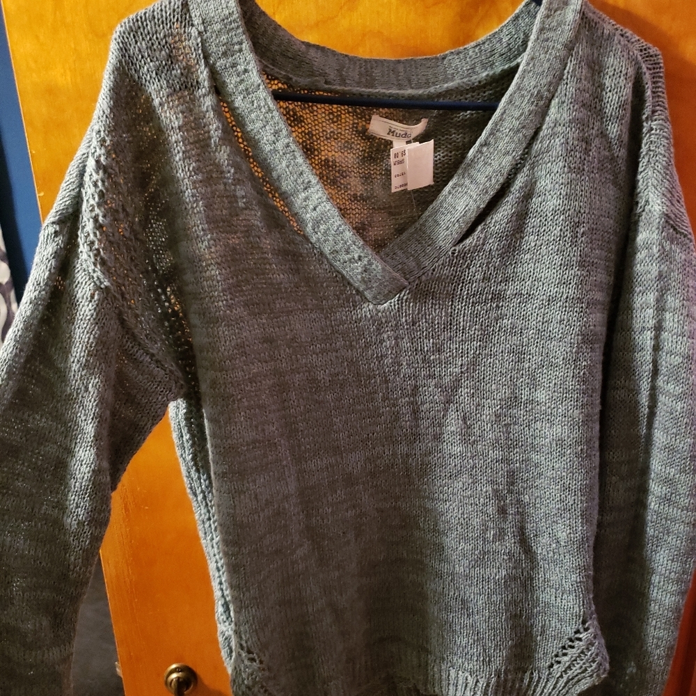 Muddy sweater